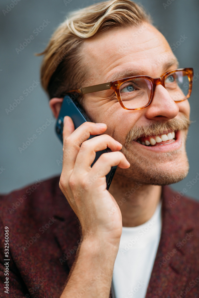Attractive Man Talking on Mobile Phone Attractive Man Talking on Mobile Phone
