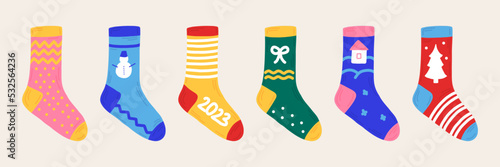 New Year set Christmas socks hand drawn style. Isolated stickers, elements for the design of brochures, invitations.