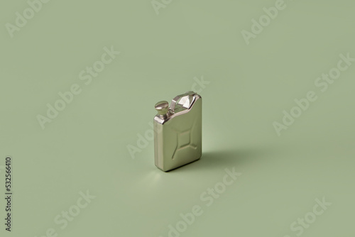 Steel canister on green background.