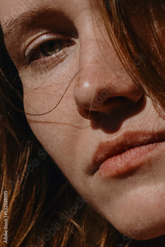 Close Up woman's portrait with Red hair and green eyes