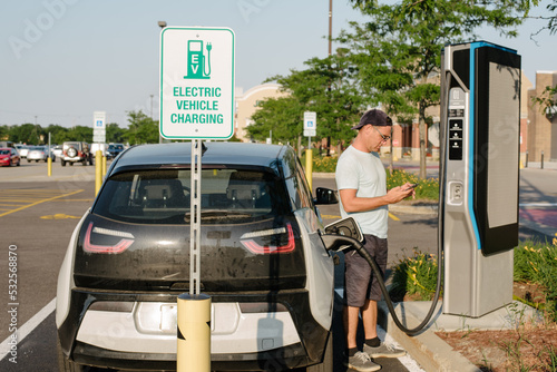 Man checking EV charge on app