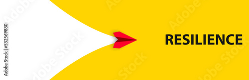 Airplane red airplane towards the word RESILIENCE.
Endurance idea concept.