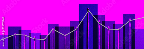 Graph running through the eyes of needles. Business accuracy concept