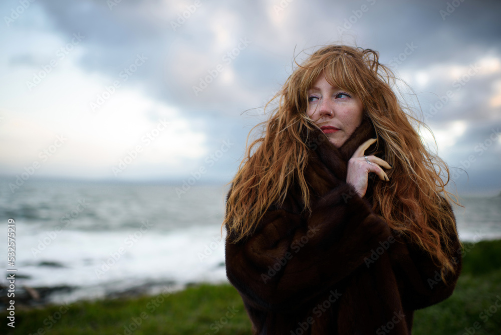 Woman with cold winds blowing Woman with cold winds blowing
