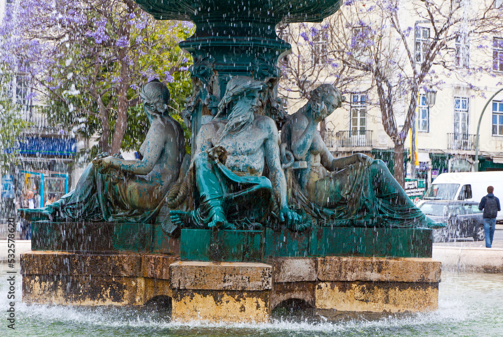 Bronze fountain at Rossio square in Lisbon, Portugal