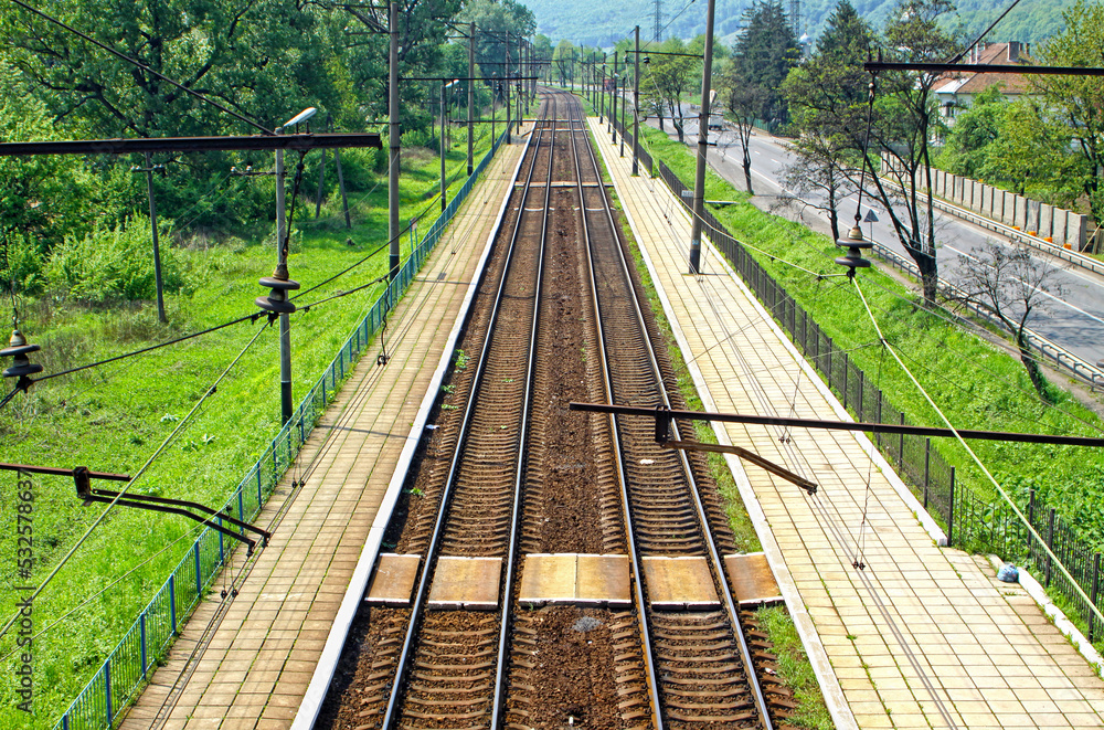 Railway tracks and small railway station in Carpathians, Ukraine Railway tracks and small railway station in Carpathians, Ukraine