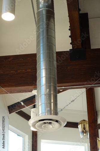 Exposed duct work in the ceiling can give a contemporary look.