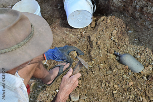 Australian man searching for sapphire gem stone photo