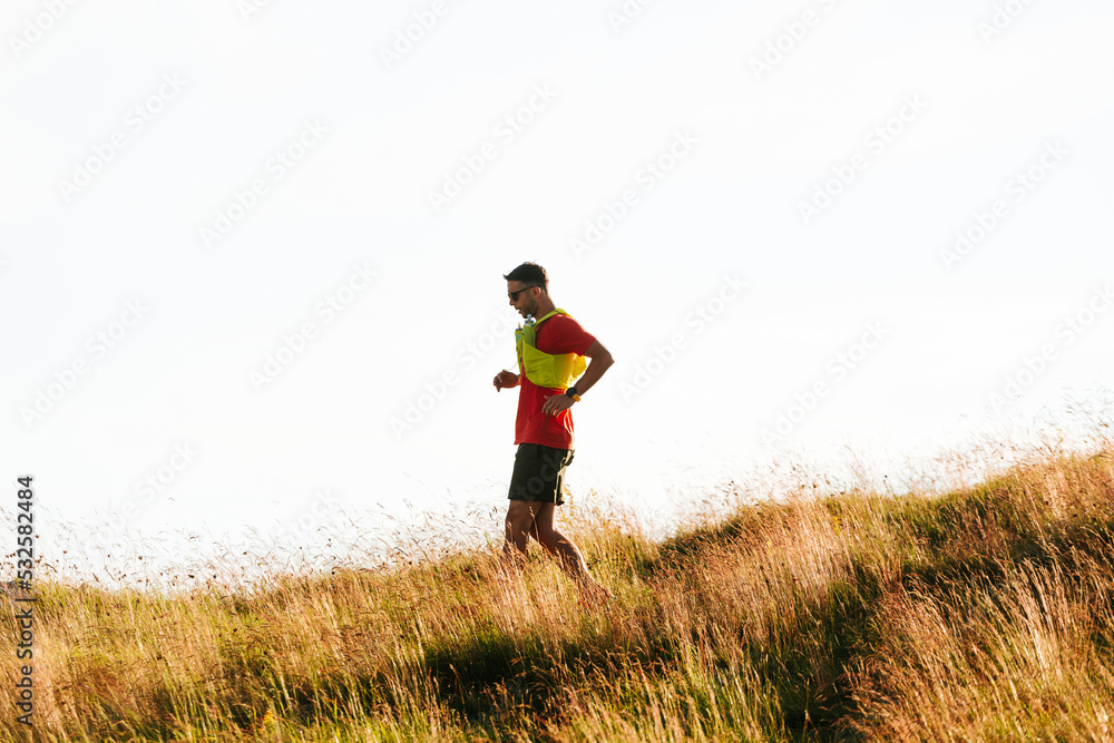 Man Running Down The Yellow Field. Man Running Down The Yellow Field.