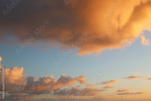 Glowing Orange Clouds At Sunrise photo