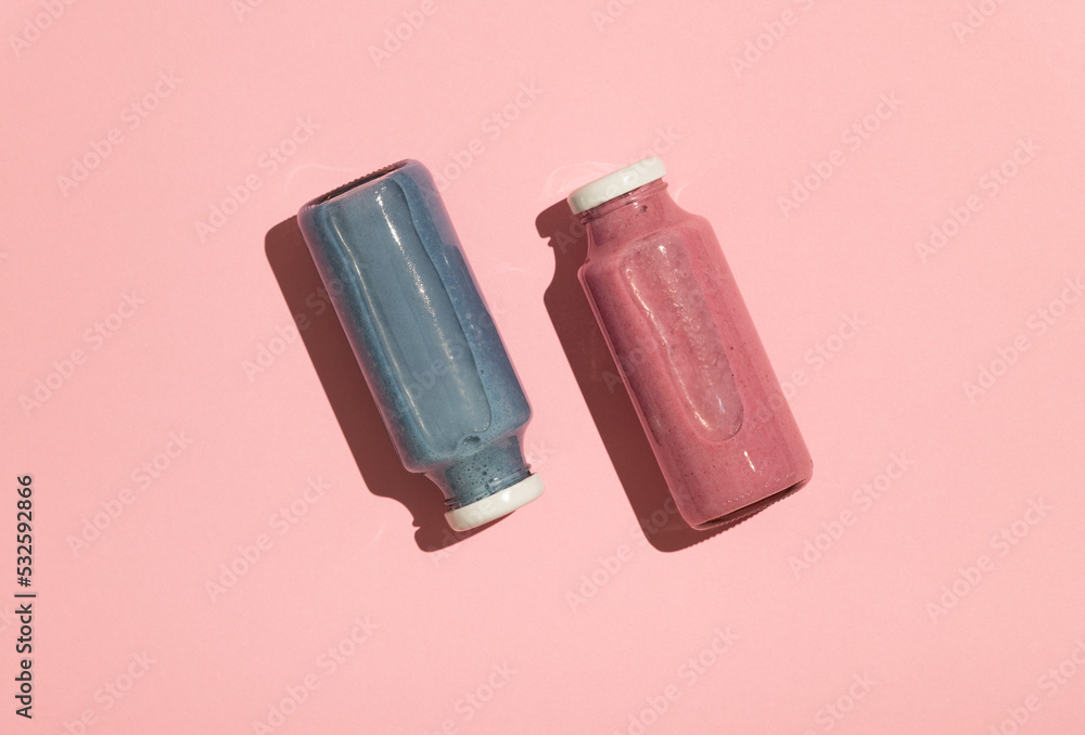 Pink pitaya (dragon fruit) and blue spirulina superfood drinks Stock