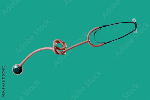 stethoscope on a green background photo