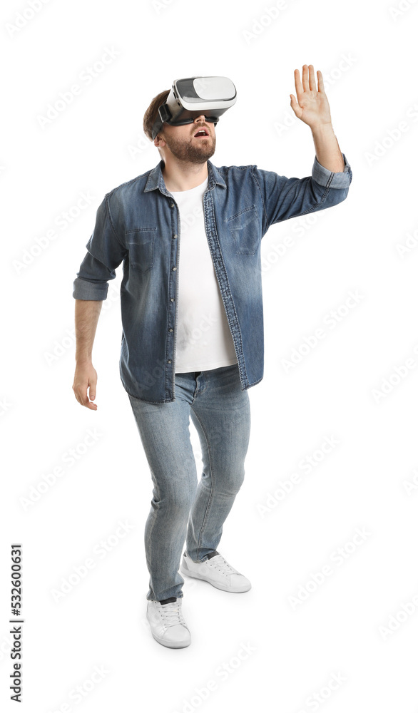 Emotional man using virtual reality headset on white background Emotional man using virtual reality headset on white background