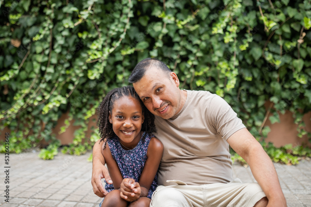 multiracial family of father and daughter in the park outdoors multiracial family of father and daughter in the park outdoors