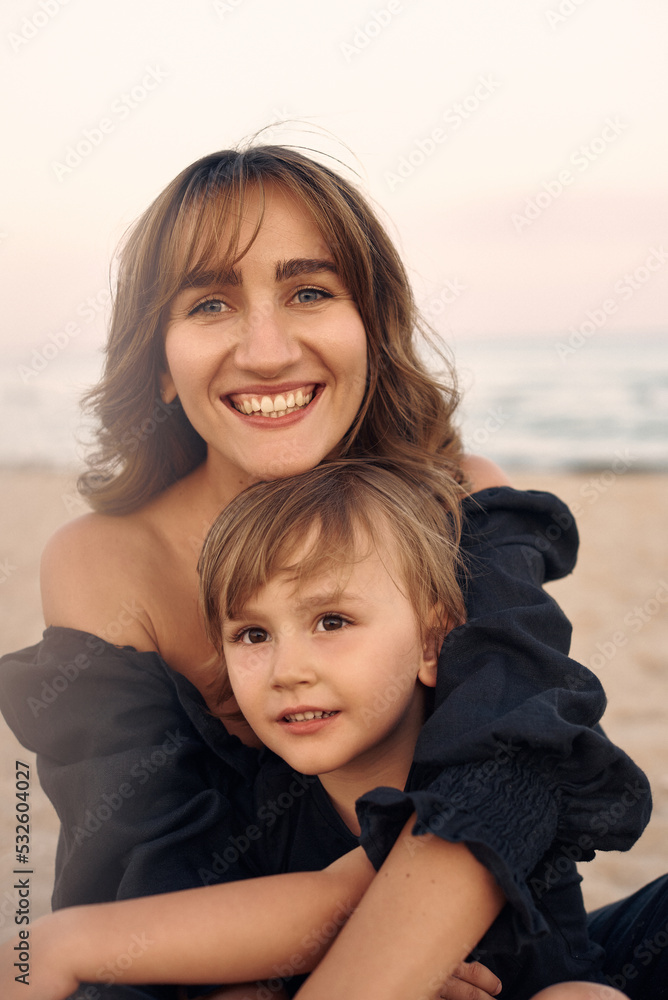 portrait of a young mother with her son portrait of a young mother with her son