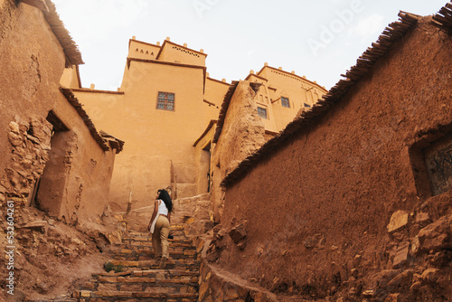 Tourist in a village in morocco photo