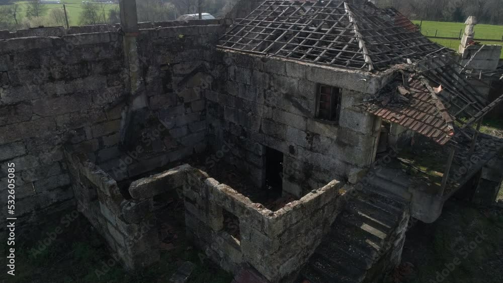 Flying over the ruins of an abandoned house Flying over the ruins of an abandoned house