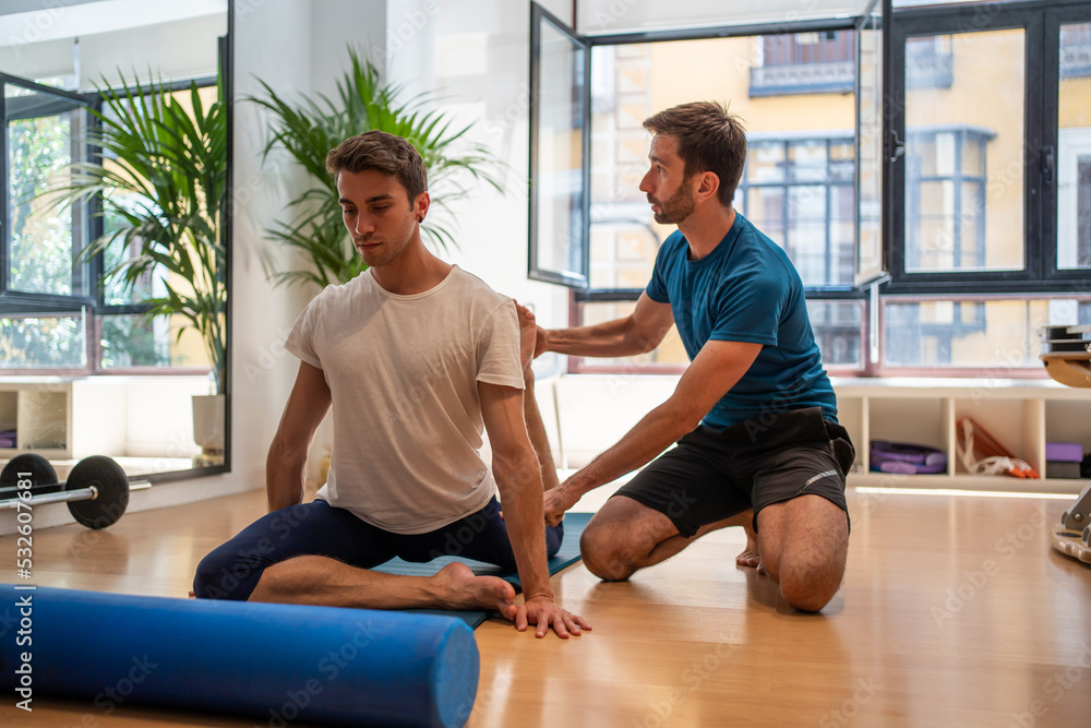 Young Man In A Physiotherapy Center. Young Man In A Physiotherapy Center.