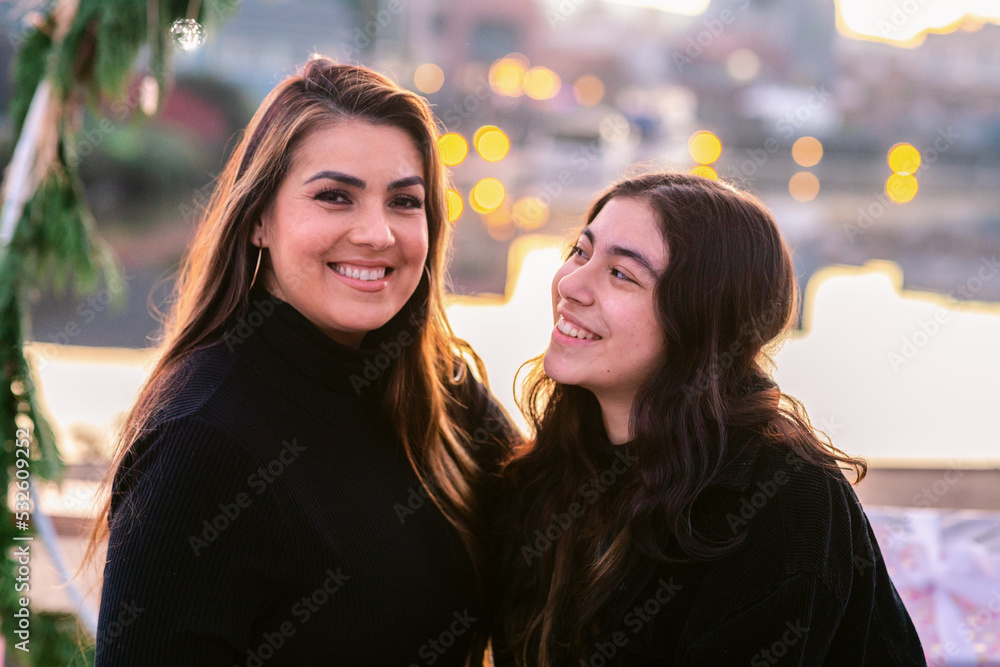 Mother and teen daughter Christmas portrait Mother and teen daughter Christmas portrait