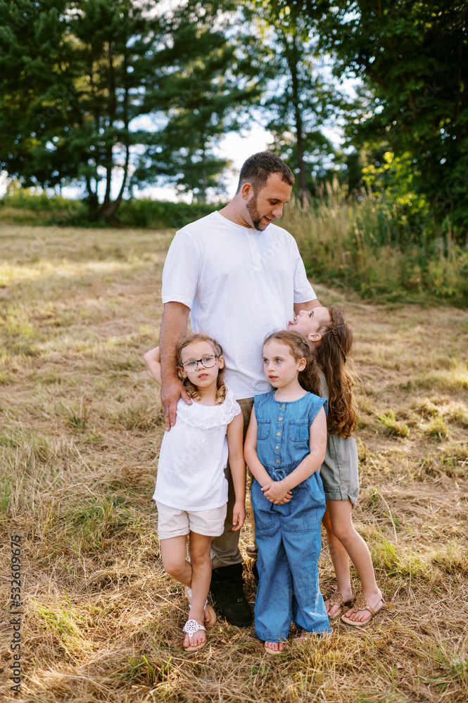 Father with his three daughters Father with his three daughters