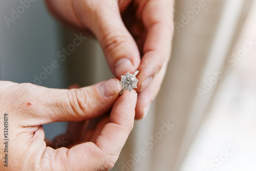 Man holding a diamond ring photo