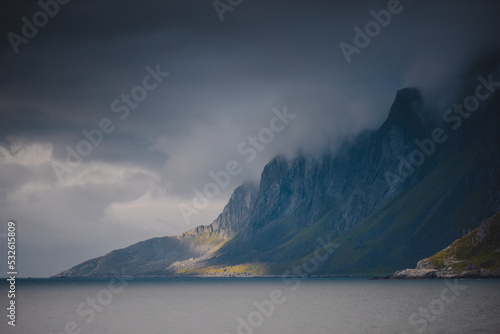 Mountain range in Lofoten fjord photo