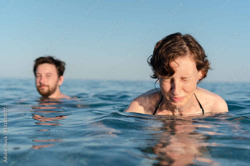 Funny expression woman swimming Funny expression woman swimming