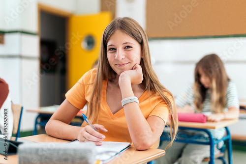 Portrait of caucasian teenage student photo