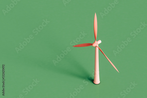 a pink wind turbine. renewable energy concept photo