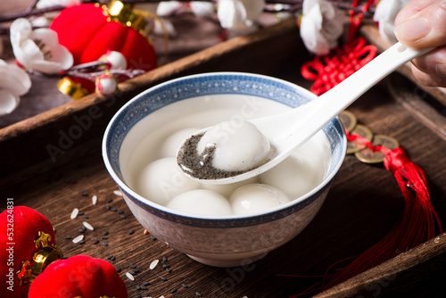 Glue pudding or tangyuan in bowl.Chinese Lantern Festival food. photo