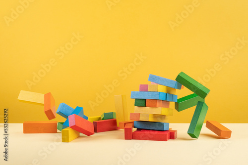 wooden blocks falling apart