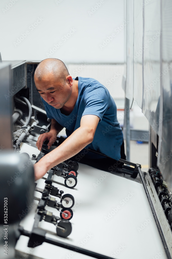 Male employer in factory Male employer in factory