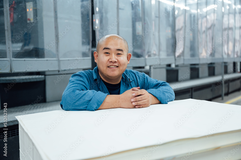 © ZQZ Studio/Stocksy - Asian worker in factory