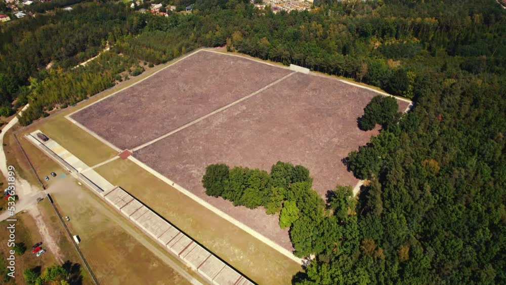 Top view of former nazi death camp remains surrounded by forest. Holocaust memorial museum Belzac Death Camp. Horizontal shot. High quality 4k footage Top view of former nazi death camp remains surrounded by forest. Holocaust memorial museum Belzac Death Camp. Horizontal shot. High quality 4k footage