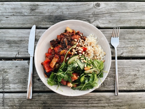 Ogranic healthy filling vegan meal on a wooden table photo