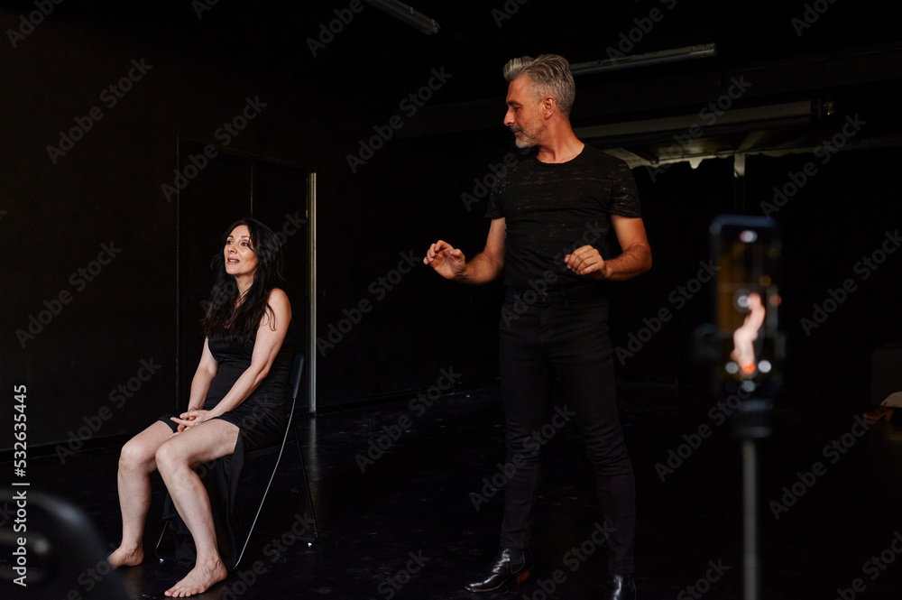 Two mature modern dancers rehearsing Two mature modern dancers rehearsing