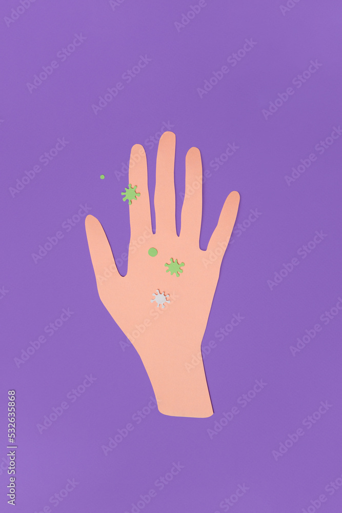 Paper craft hand with virus on violet background
Paper craft hand with virus on violet background