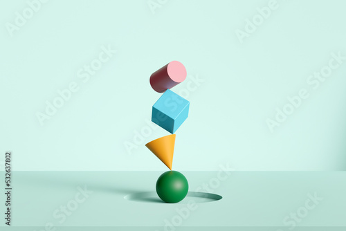 Colored geometric shapes balance concept background  photo