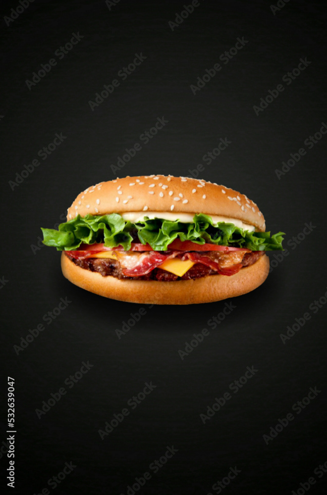 A burger is a piece of meat that is topped with vegetables and sandwiched by bread. A burger is a piece of meat that is topped with vegetables and sandwiched by bread.