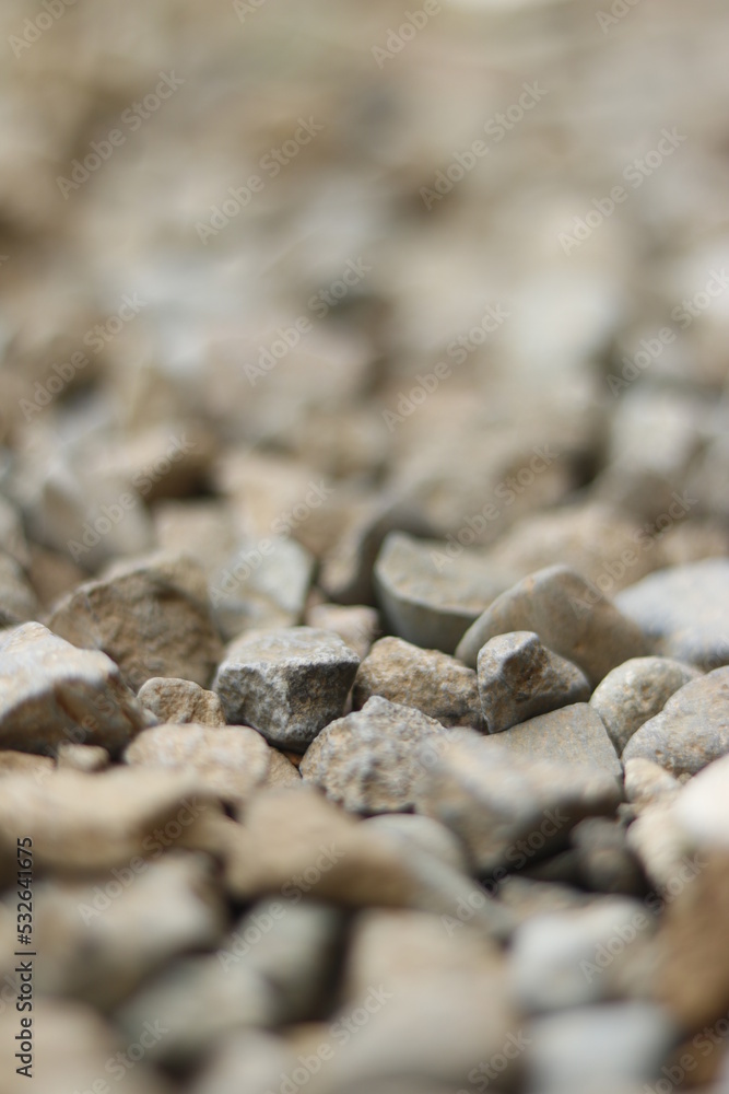 Close up gray stones pebbles abstract wallpaper texture rocks construction material