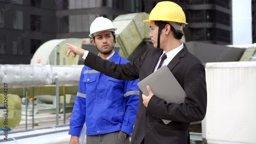 Senior engineer and businessman discussing together. Senior engineer and businessman discussing together.