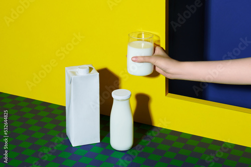 Pure milk drinks in clear jars and bottles are naturally healthy photo
