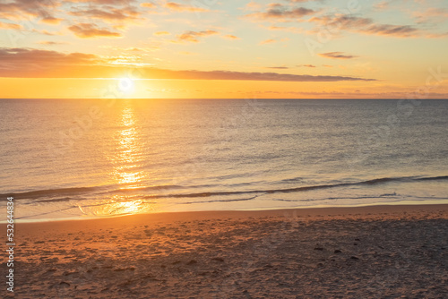 Scenic Christies Beach view at sunset  Onkaparinga  South Australia. Dolphins can be seen in the sea