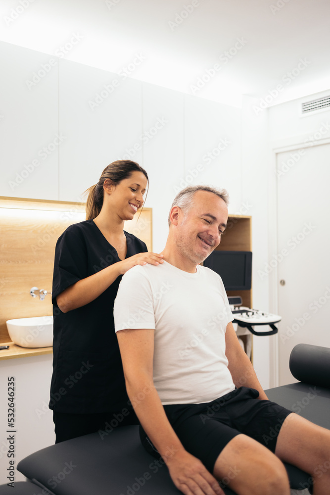 Physiotherapist working in a rehabilitation clinic Physiotherapist working in a rehabilitation clinic