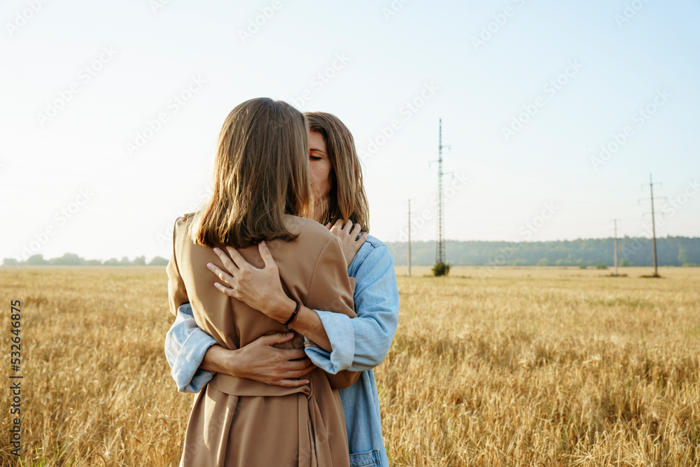 lesbian couple in wheat field lesbian couple in wheat field