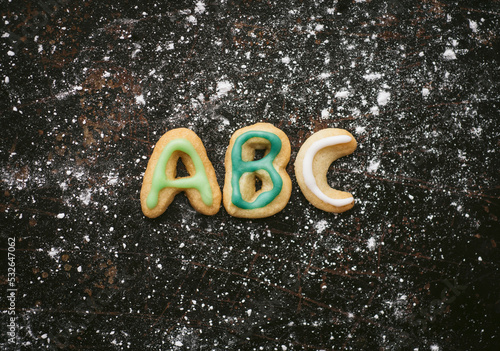 Cookies spelling out ABC on a baking tray photo