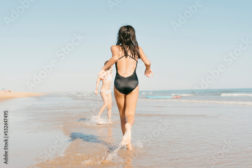 Girl running by the beach