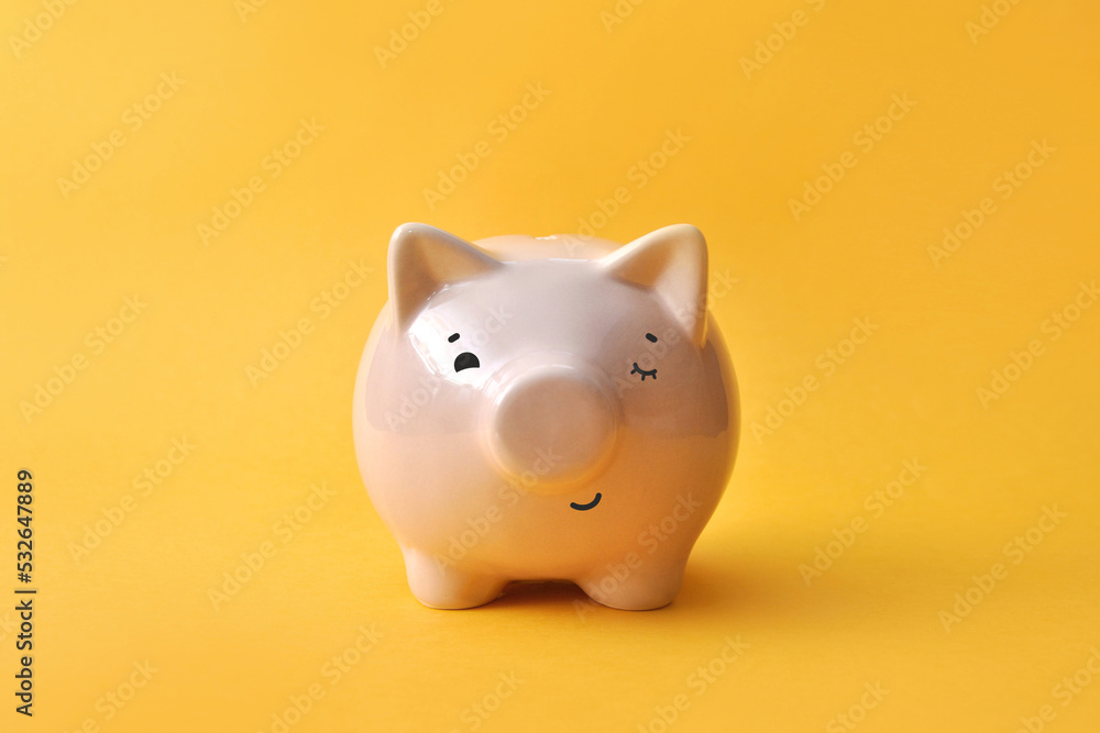 Piggy bank on a light background, a symbol of money accumulation