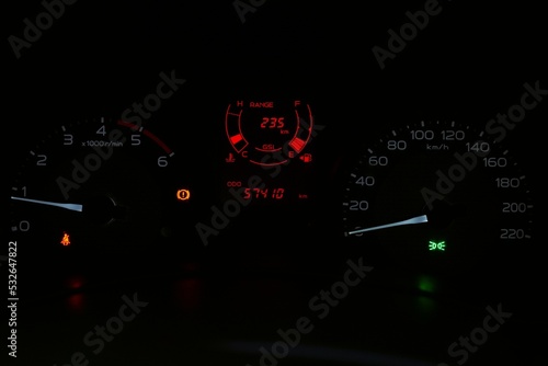 car mileage photo At night, seeing many symbols