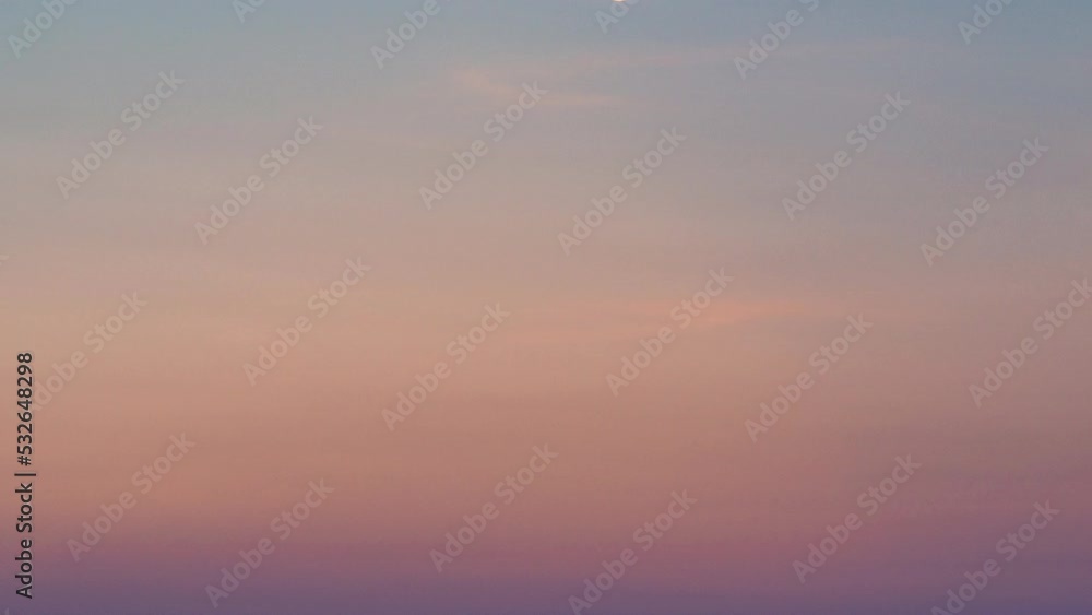 The full moon is rising in the colorful sunset sky. 4K time-lapse The full moon is rising in the colorful sunset sky. 4K time-lapse